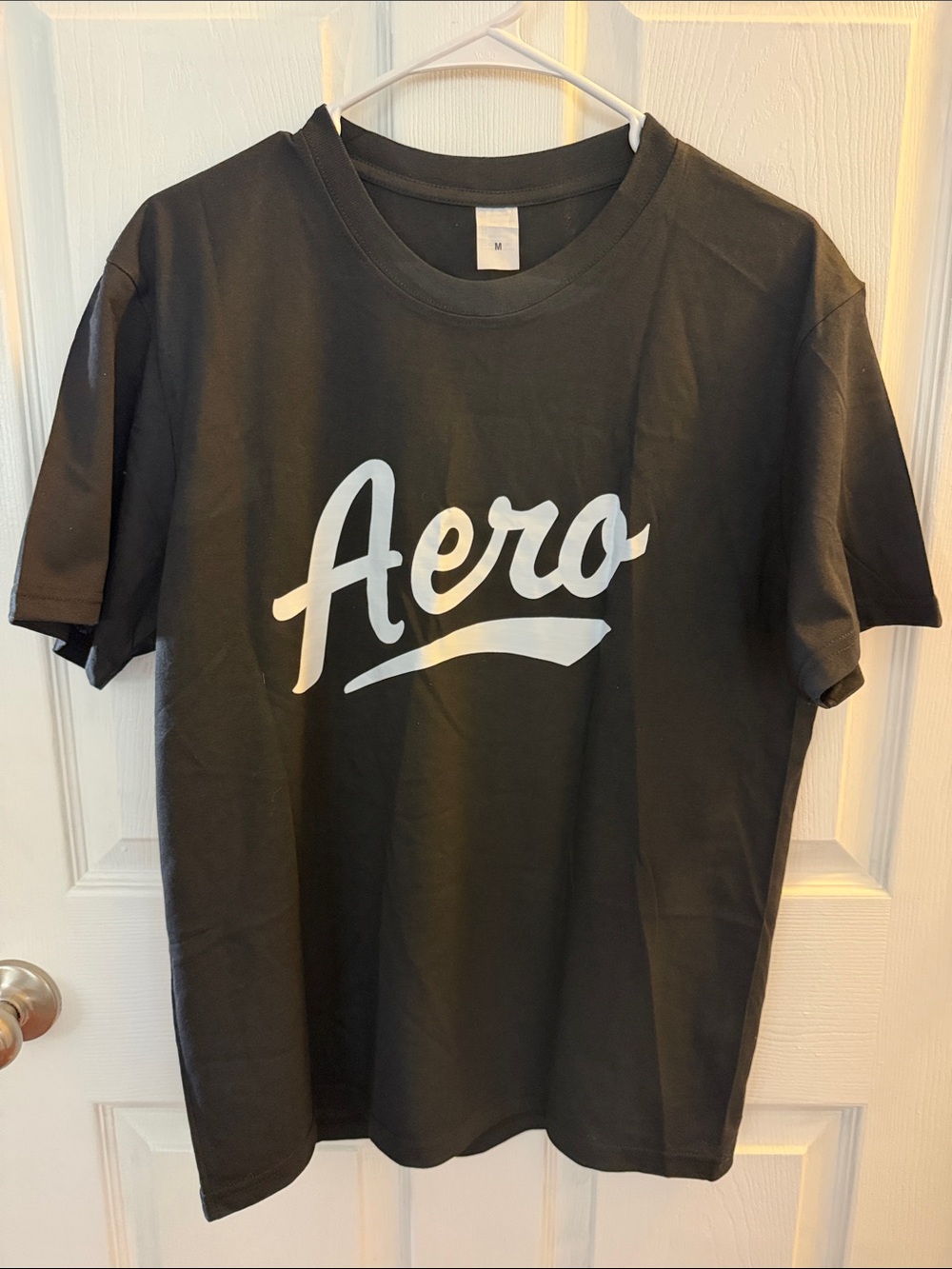 Source Unknown Black T-Shirt with White "Aero" Script